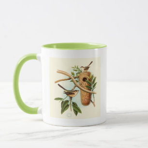 Taza Pareja de pájaro en nido posada en una rama