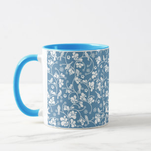 Taza patrón de aves y plantas ornamentadas