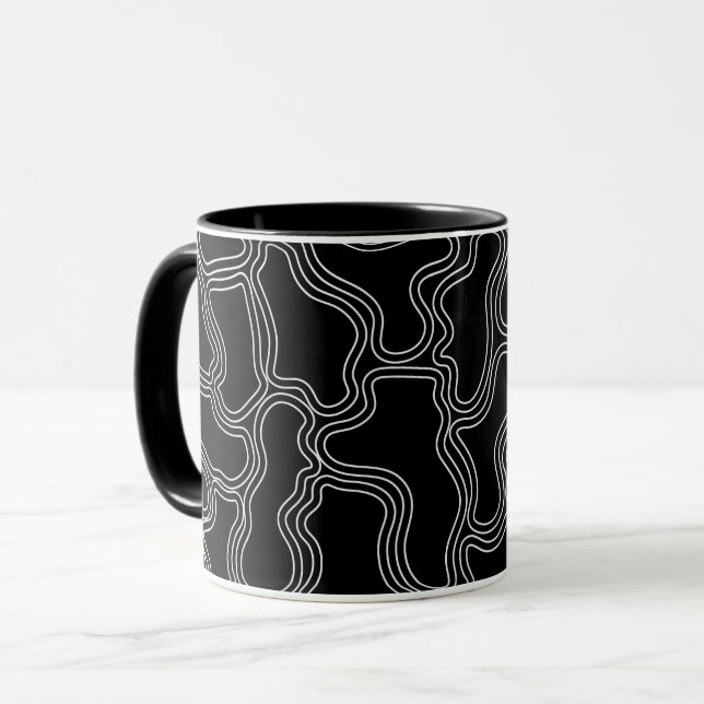 TAZA PATRÓN DE FORMAS DE LÍNEA BLANCA (Anverso izquierdo)
