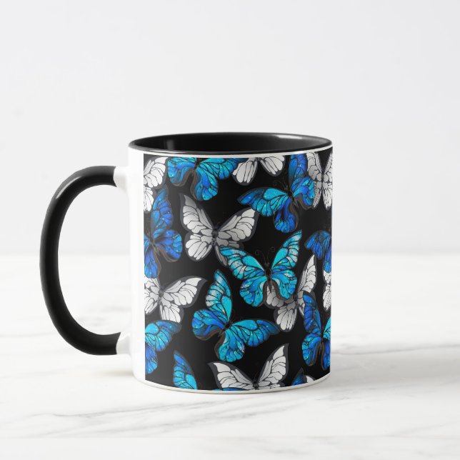 Taza Patrón oscuro sin foco con mariposas azules morfo (Izquierda)