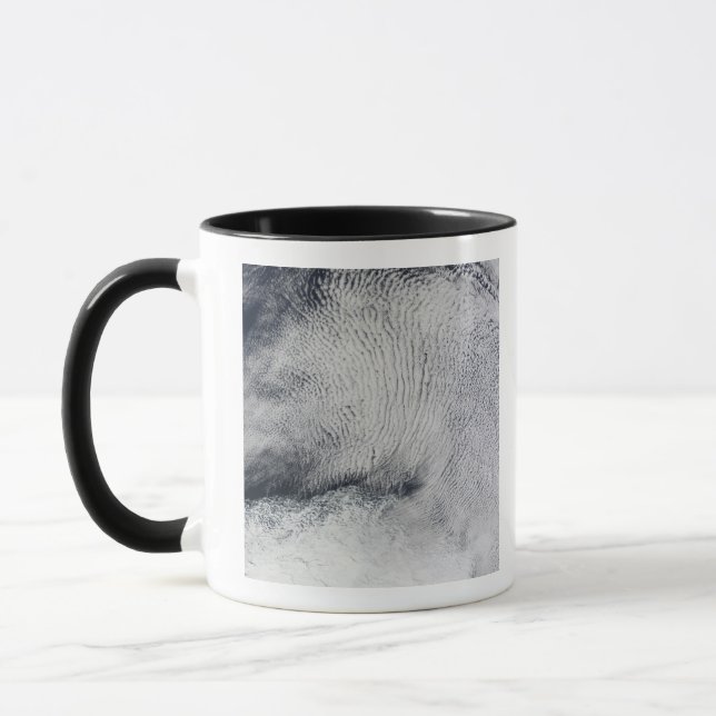 Taza Patrones de nubes y hielo marino en el Océano Aust (Izquierda)