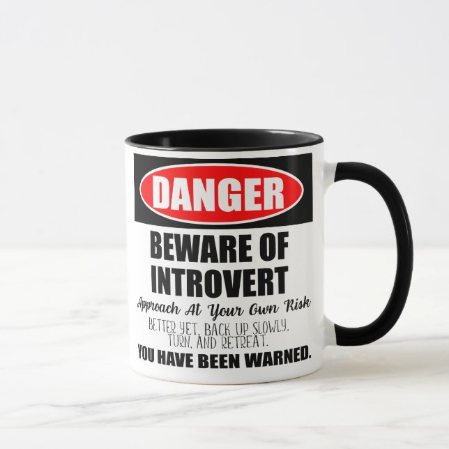 Taza Peligro Cuidado con el Rótulo introvertido (Derecha)