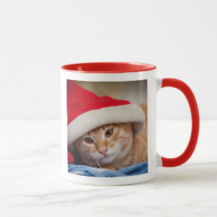 Taza Pequeño gatito en gorra rojo del navidad