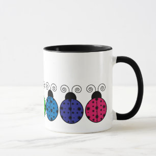 Taza perezosa de las mariquitas de la margarita