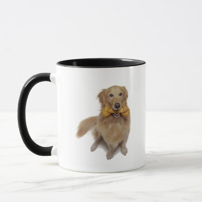 Taza Perro del golden retriever que sostiene el hueso (Izquierda)