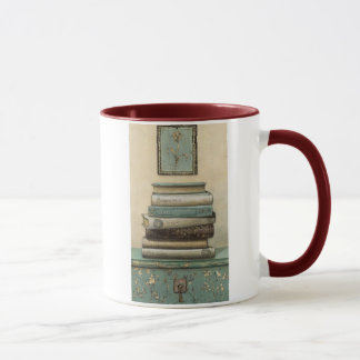 Taza pila de libros