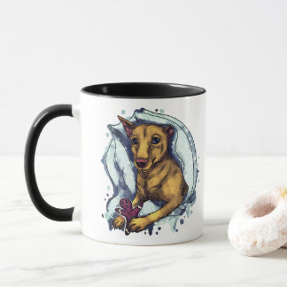 Taza Pinscher y pan de jengibre en miniatura
