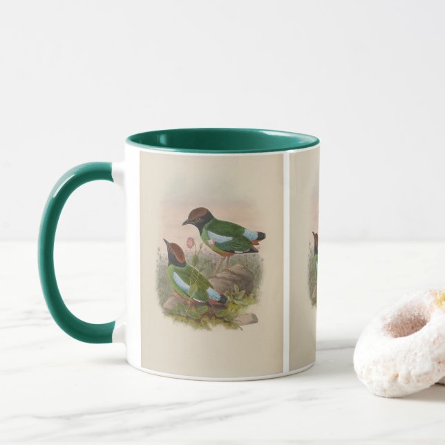 Taza Pitta capucha por John Gould (Con donut)