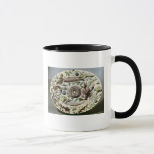 Taza Plato de Rustique Figuline con un fondo blanco
