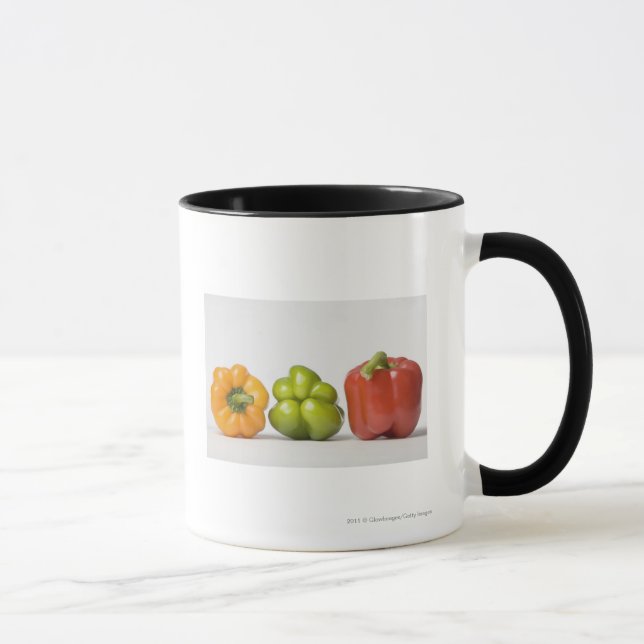 Taza Primer de los paprikas en una fila (Derecha)