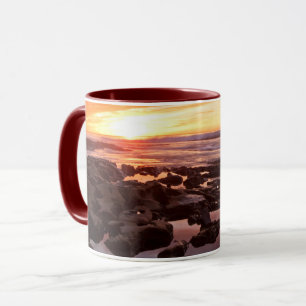 Taza Puesta de sol sobre piscinas de marea