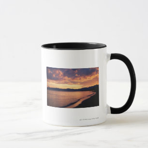 Taza Puesta del sol en la playa
