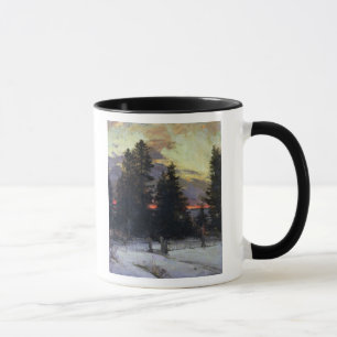 Taza Puesta del sol sobre un paisaje del invierno,
