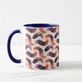 Taza púrpura, rojo, naranja y dorado.