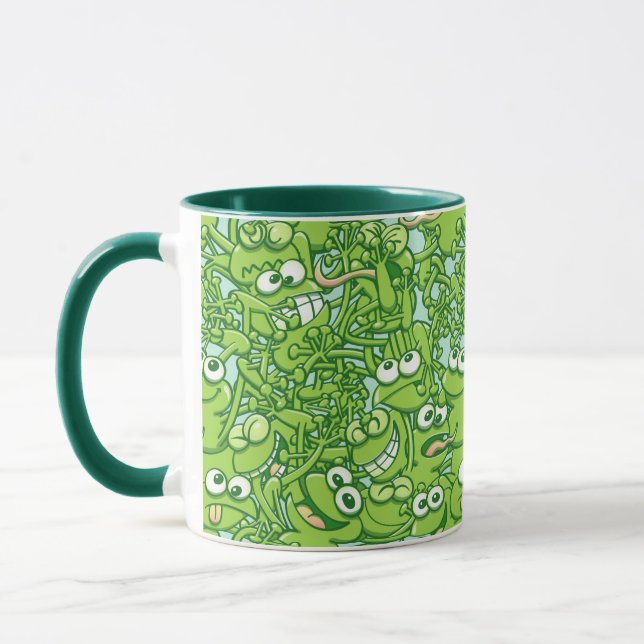 Taza Ranas verdes divertidas enredadas en un modelo (Izquierda)