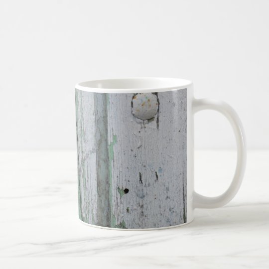 Taza resistida de la madera