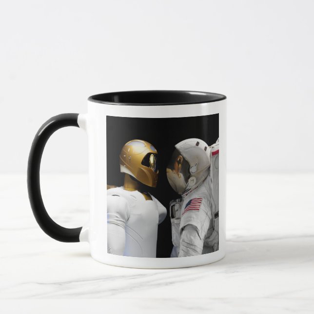 Taza Robonaut 2, un astronauta hel 3 humanoide dexteros (Izquierda)