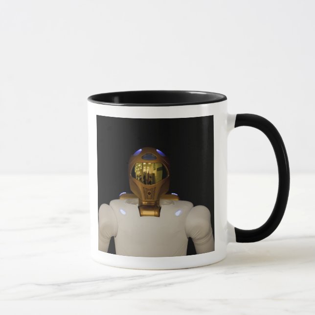 Taza Robonaut 2, un hel astronauta humanoide y dexteros (Derecha)