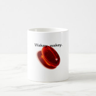 Taza roja de la píldora