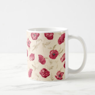 Taza roja del modelo de las amapolas