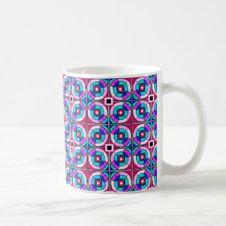 Taza rosada, azul, púrpura geométrica
