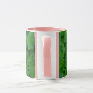 Taza rosada de la hiedra