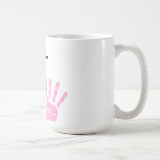 Taza rosada de la impresión de la mano de la cinta