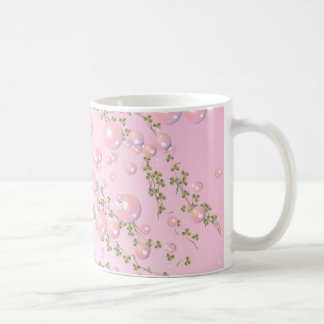 taza rosada de la perla
