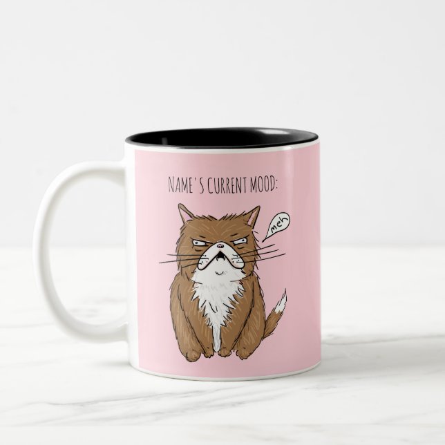 Taza rosada del gato de Meh del humor actual (Izquierda)