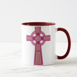 Taza rosada del vidrio de la cruz céltica