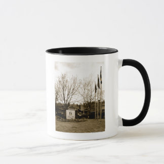 Taza Rótulo de entrada y vista de lodge