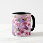 Taza Sakura rosa sobre fondo de pintura<br><div class="desc">Dibujado artísticamente,  rama de rosa,  flores de cerezo sobre fondo pintoresco,  texturizado,  pintado con pintura blanca,  rosa y azul. Pink Sakura</div>