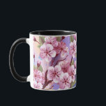Taza Sakura rosa sobre fondo de pintura<br><div class="desc">Dibujado artísticamente,  rama de rosa,  flores de cerezo sobre fondo pintoresco,  texturizado,  pintado con pintura blanca,  rosa y azul. Pink Sakura</div>
