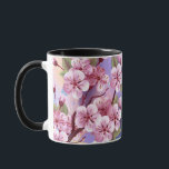 Taza Sakura rosa sobre fondo de pintura<br><div class="desc">Dibujado artísticamente,  rama de rosa,  flores de cerezo sobre fondo pintoresco,  texturizado,  pintado con pintura blanca,  rosa y azul. Pink Sakura</div>