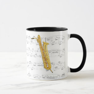 Taza - saxofón bajo con partitura