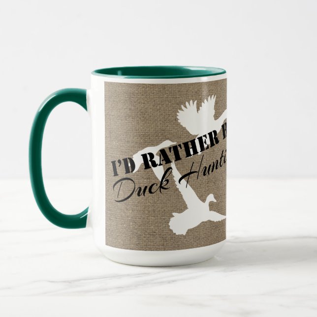 Taza Sería bastante patos y arpillera de la caza del (Izquierda)