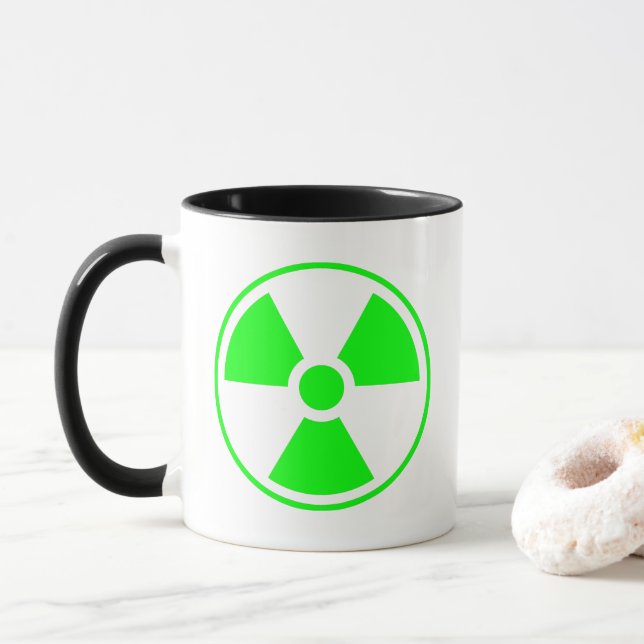Taza Símbolo de radiación nuclear radiactiva en verde (Con donut)