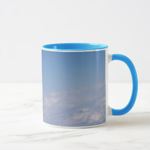 Taza sobre las nubes