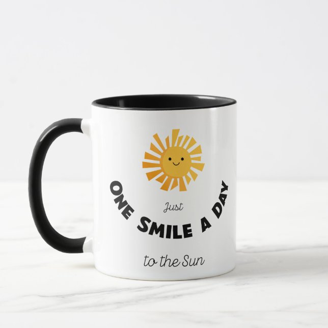 Taza Sólo una sonrisa al día al sol (Izquierda)