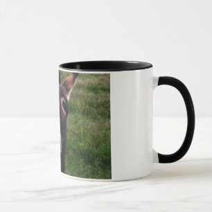 Taza sonriente del burro