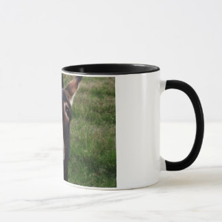 Taza sonriente del burro