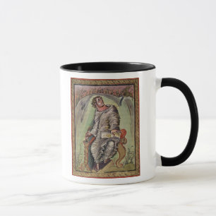 Taza St Mark en su escritorio