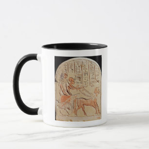 Taza Stela que representa un escribano que conduce un