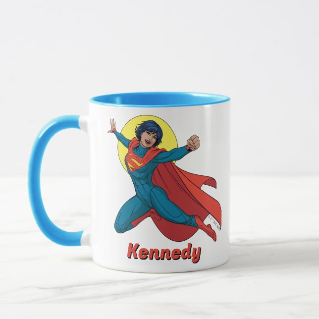 Taza Supergirl volando con traje azul (Izquierda)