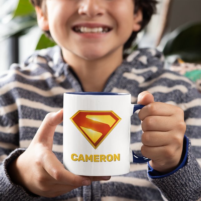 Taza Superman Golden S Shield Brilliance (Kid holding mug)