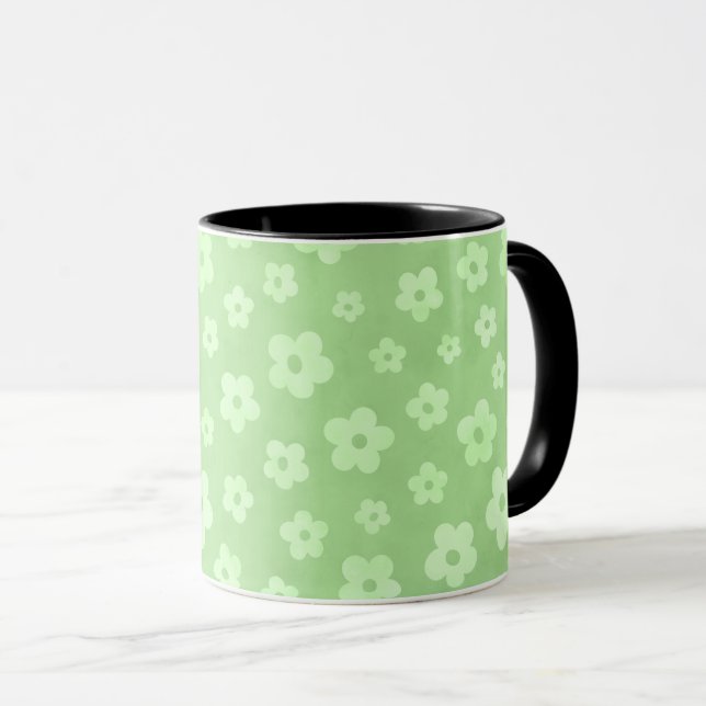 Taza Té de flores verdes y blancas con mango negro (Anverso derecho)
