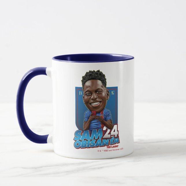 Taza Ted Lasso | Sam Obisanya Bobblehead (Izquierda)