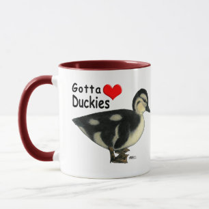 Taza Tengo que amar a los patitos
