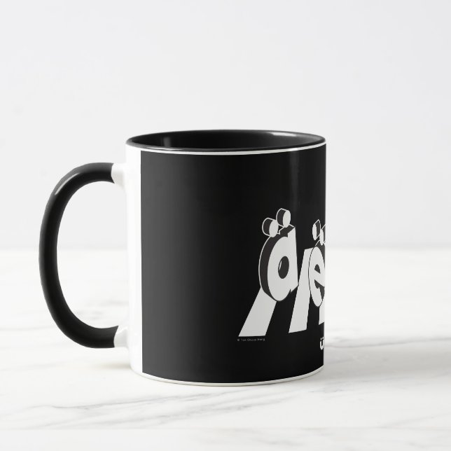 Taza “The Umlauts: Crossing Over” (Izquierda)