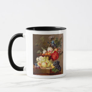 Taza Todavía vida con la fruta y las flores